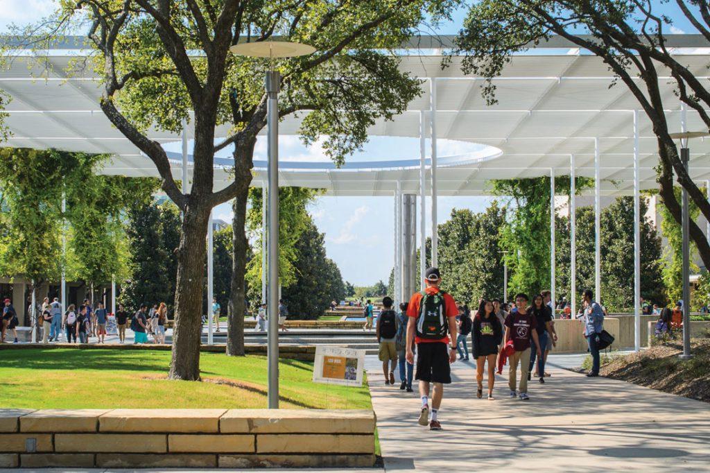 Students walking near Trellis Plaza