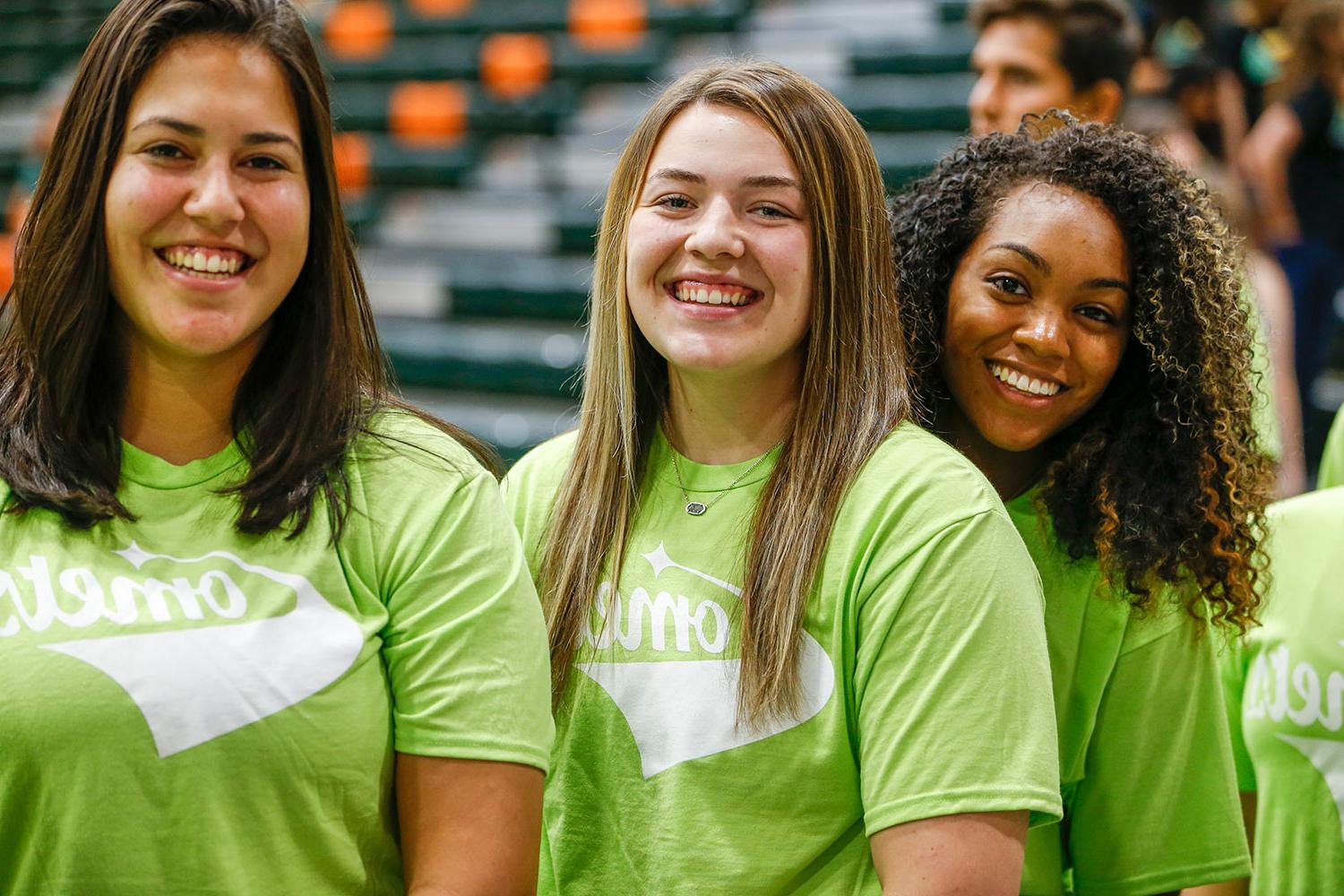 students wearing green Comets shirts