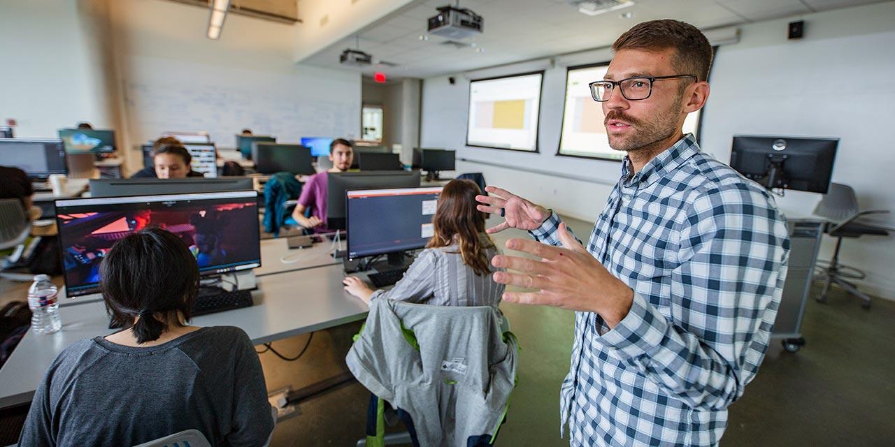 A faculty member teaching in an ATEC classroom