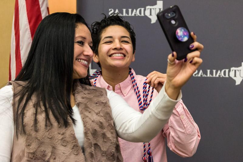 Two students taking a selfie.