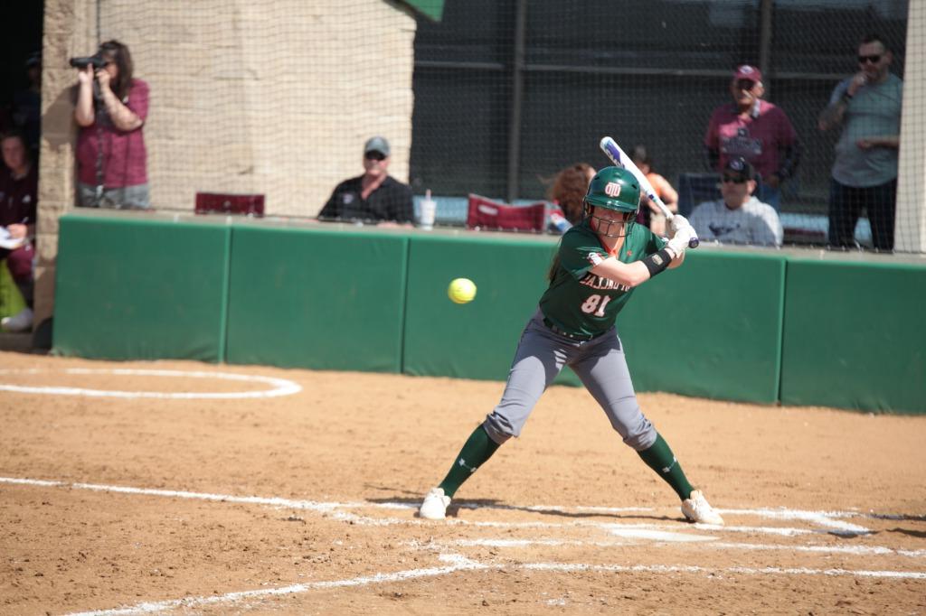 Photo of a softball player at bat.