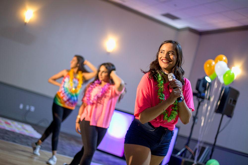 Students dancing and singing